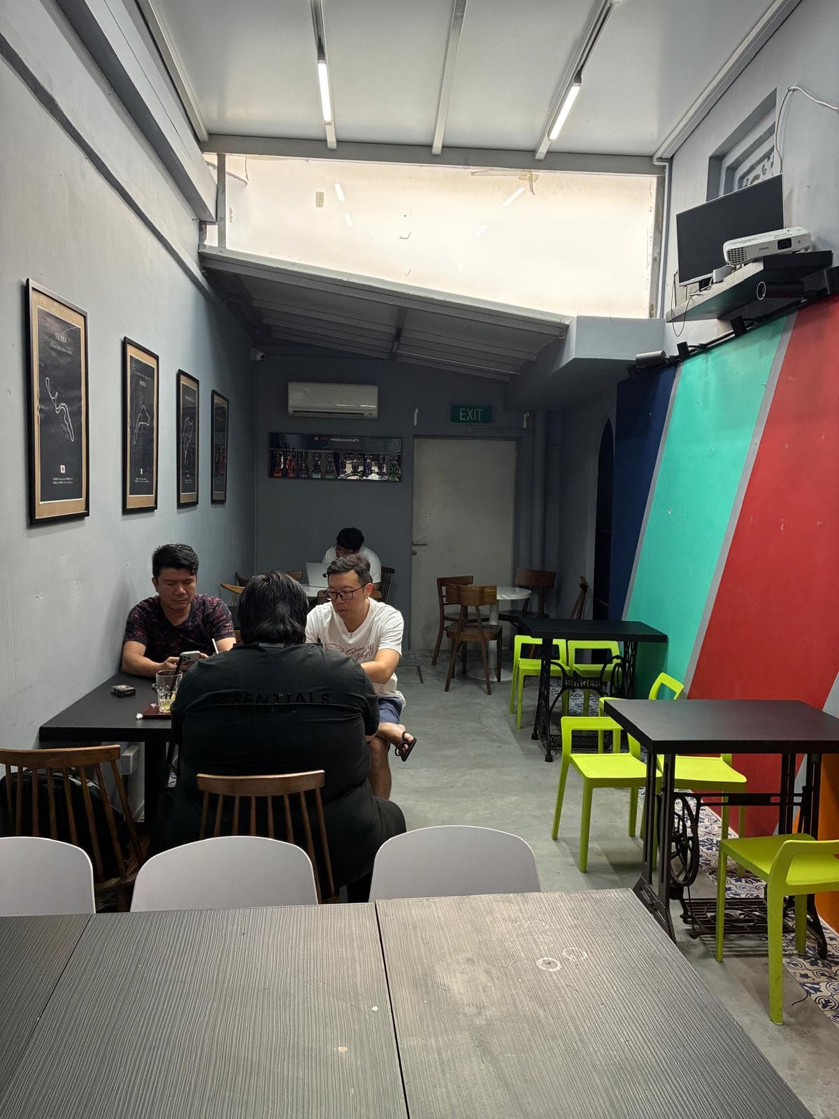 Tables and seating in the KAISH café and TCG play space